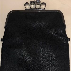 Four Ring Skull Clutch